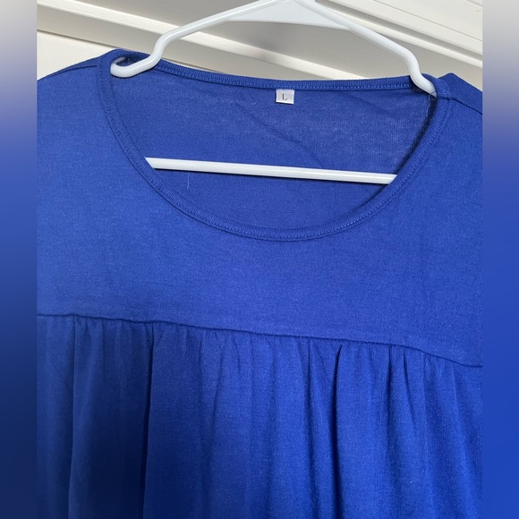 Blue long sleeved shirt with ruffled sleeves. Size Large. Never worn, gifted. - Picture 3 of 3